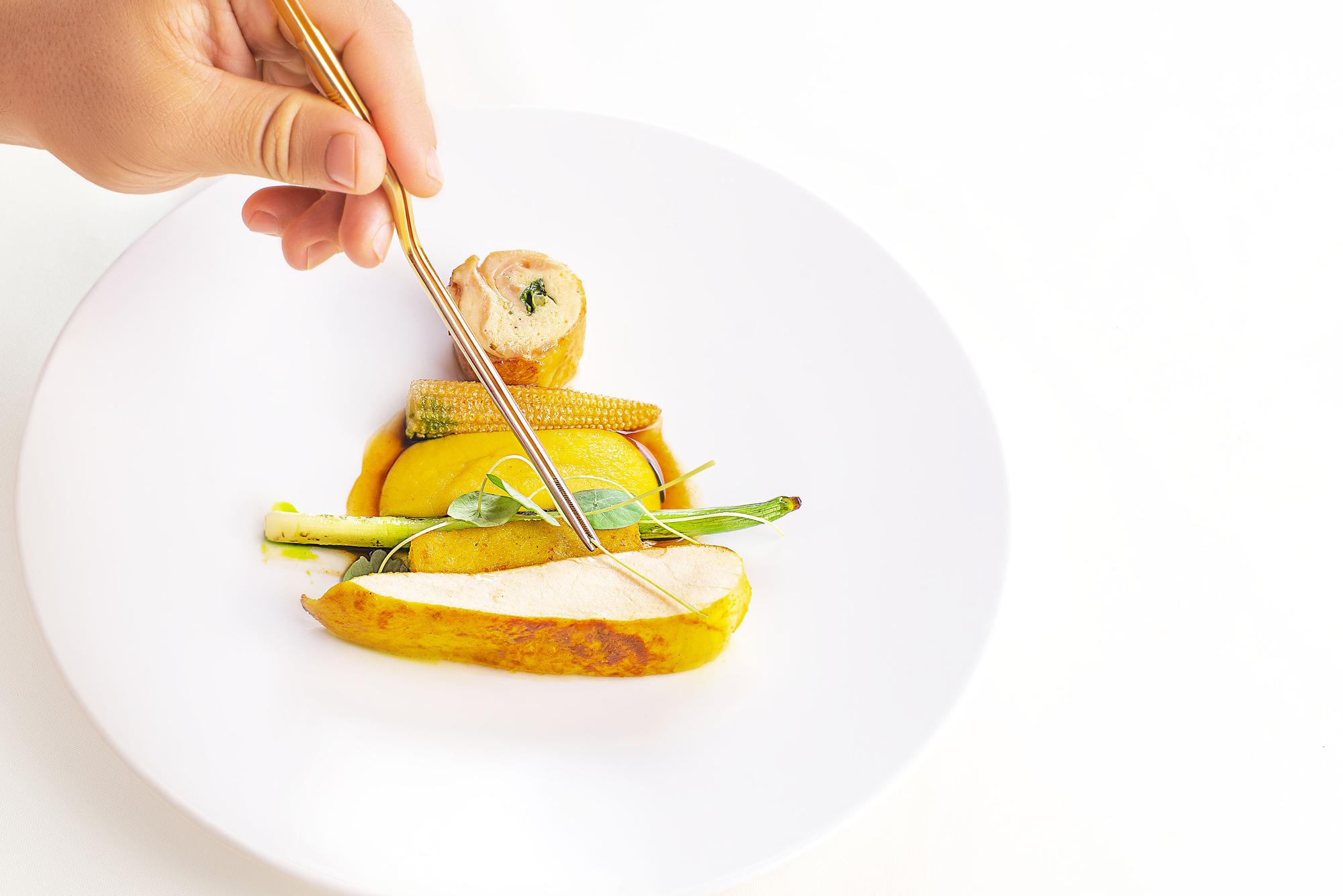 Students plating modern dish